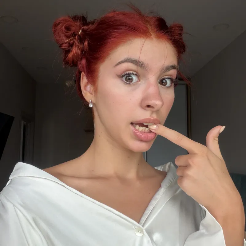 Redhead girl with space buns
